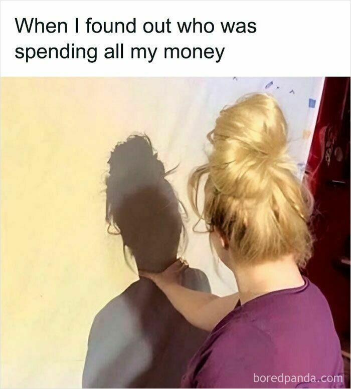 Person with blonde hair in a bun pretending to choke their own shadow, illustrating relatable memes about money struggles.