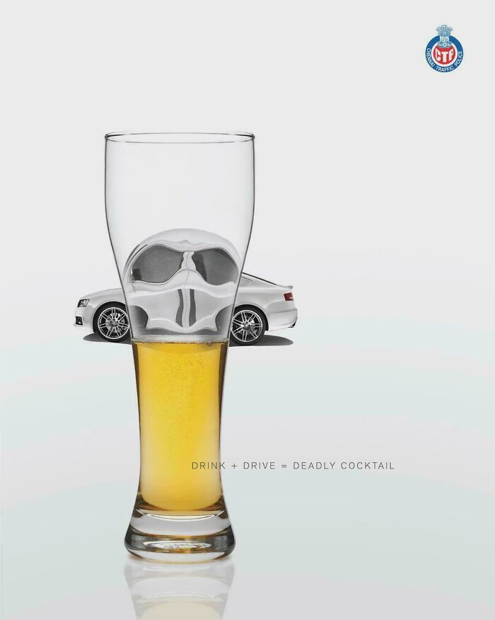 Glass of beer with a distorted car behind, highlighting designer creativity in making the world smarter and cooler.