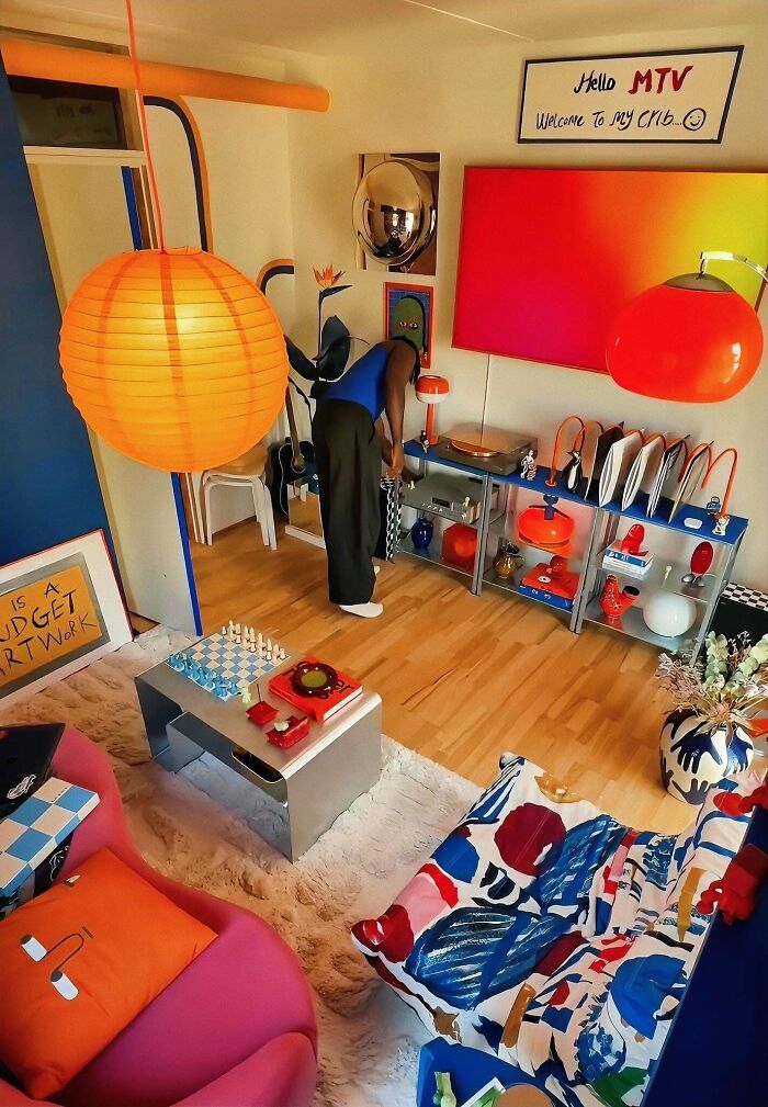 Bright and colorful home decor with modern furniture and artistic elements, showcasing a proud home decoration style.