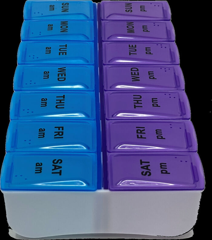 Weekly pill organizer with labeled compartments for am and pm doses, a classic item to make you feel old as heck.