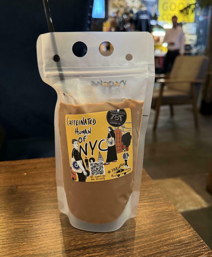 Creative coffee drink in resealable pouch served at an innovative bar and restaurant known for unique presentation.