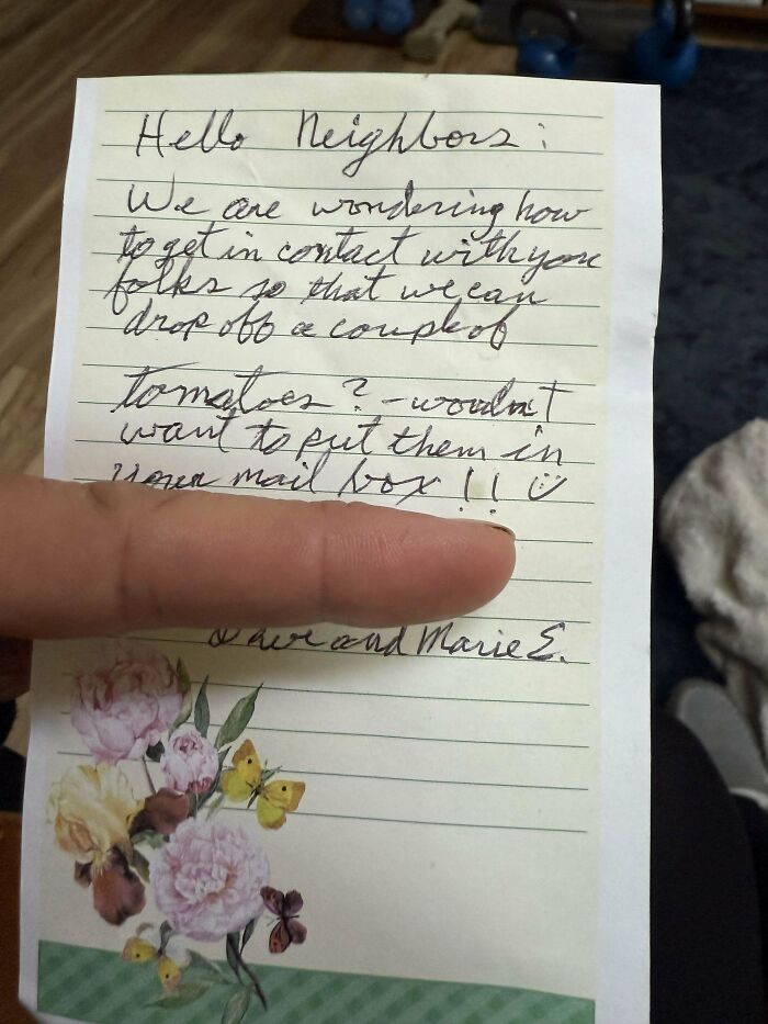 Handwritten note from wholesome kind neighbors asking how to drop off tomatoes without using the mailbox, floral paper design. Handwritten note from wholesome kind neighbors asking how to drop off tomatoes without using the mailbox, floral paper design.