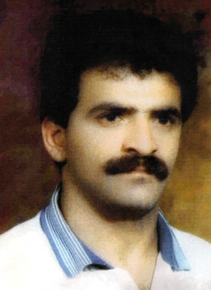 Portrait of a man with a mustache and dark curly hair, representing chilling disappearances from the ’90s mystery cases.