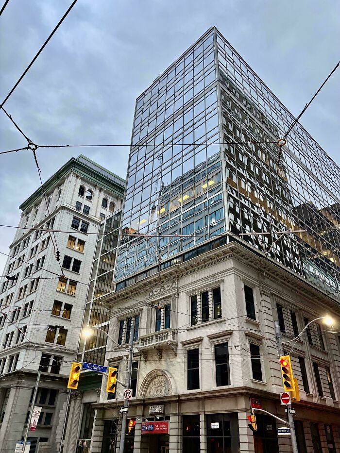 Epitome Of Toronto: A Modern Glass Building Atop A Historic Base