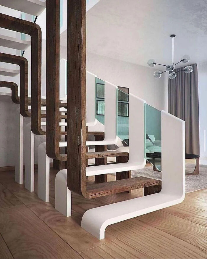 Modern staircase with smart and cool design features combining wood and white elements in a contemporary living space.