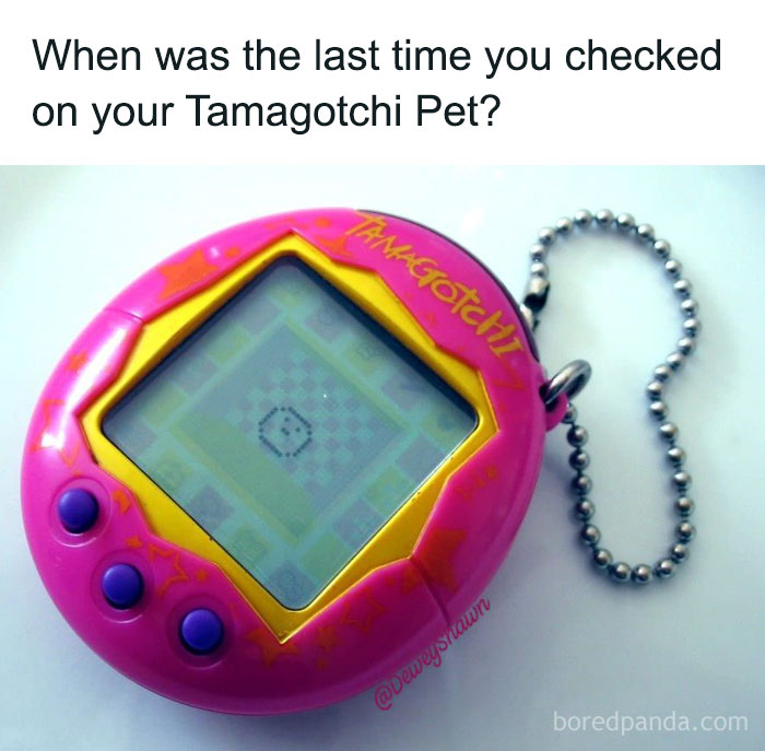 Pink Tamagotchi digital pet with chain, symbolizing 90s kids nostalgia and popular virtual toys of that era.