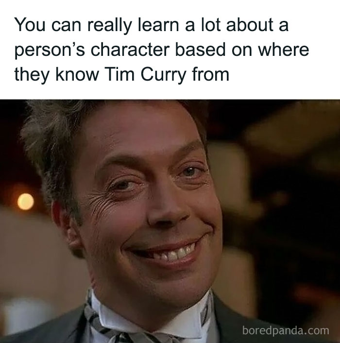 Smiling man dressed in vintage clothing illustrating 90s kids nostalgia with a caption about Tim Curry recognition.