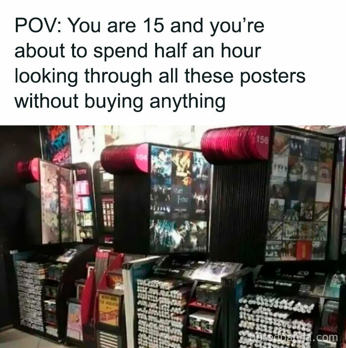 Rows of nostalgic posters displayed in a store evoking '90s nostalgia club memories of browsing without buying.