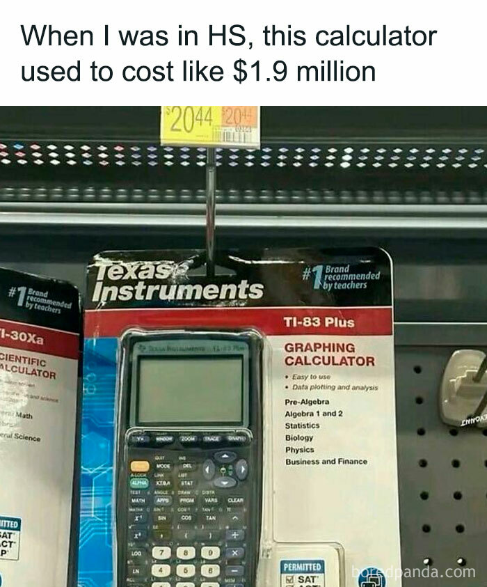 Graphing calculator packaging from the ’90s nostalgia club showing Texas Instruments TI-83 Plus model on store shelf.