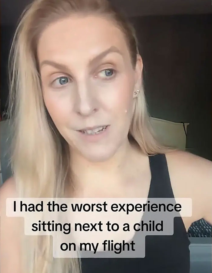Woman sharing her worst experience with a bored child on flight, sparking passenger debate on travel discomfort. Woman sharing her worst experience with a bored child on flight, sparking passenger debate on travel discomfort.