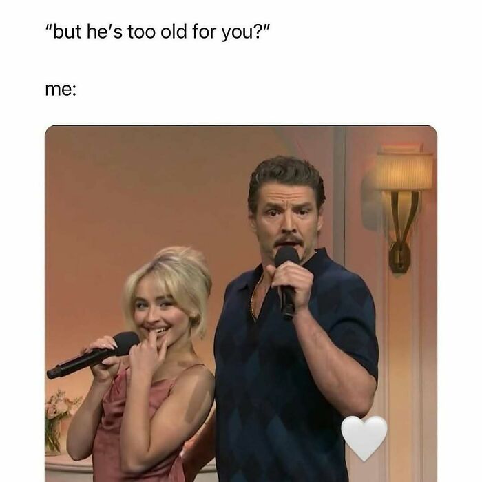 Two people holding microphones with a humorous expression, representing introvert-worthy memes and relatable moments.