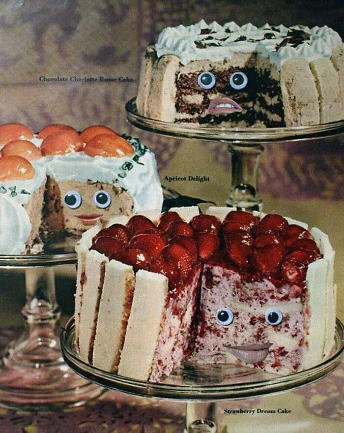 Three vintage cakes with googly eyes and lips on glass stands, evoking June Cleavers vintage closet charm.