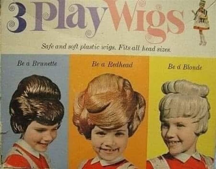 Vintage advertisement showing three girls modeling old-timey 3 play wigs in brunette, redhead, and blonde styles.