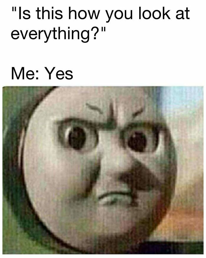 Grumpy Thomas the Tank Engine face meme expressing frustration, a funny image for hilarious memes and good vibes.