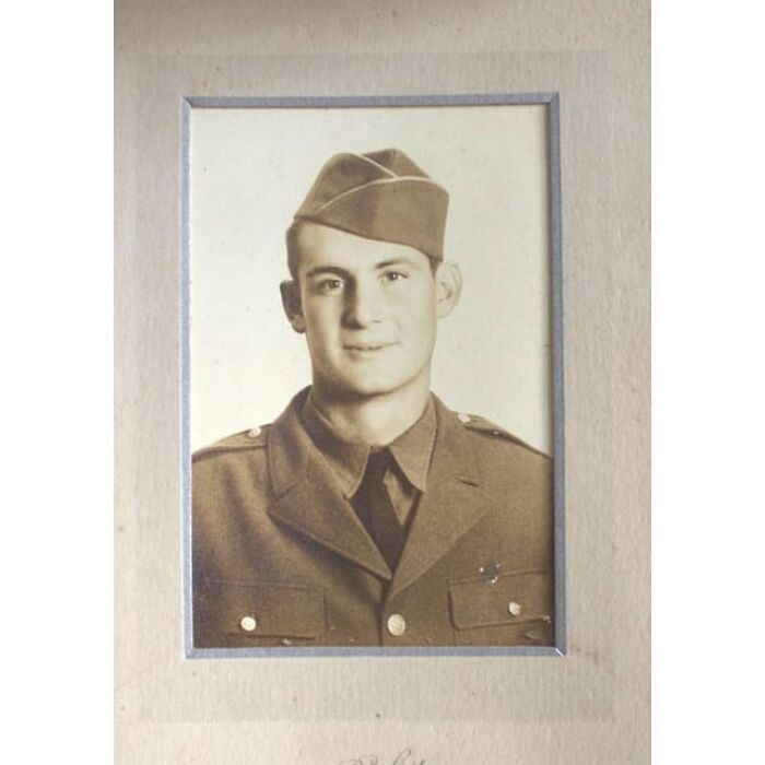 Vintage historical photo of a young soldier in uniform, part of 79 historical photos with interesting backstories.