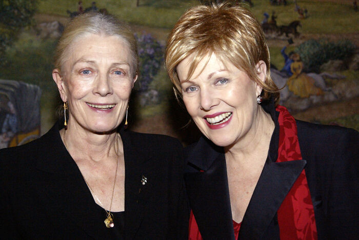 Two women smiling together at an event, representing legendary entertainment families passing the spotlight down generations.