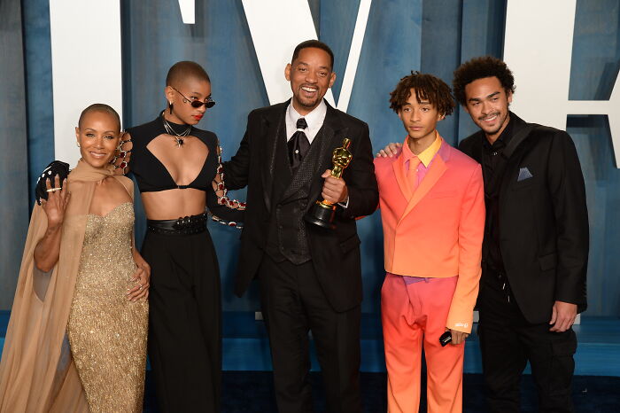 Will Smith and family posing at an event, representing legendary entertainment families passing down the spotlight through generations.