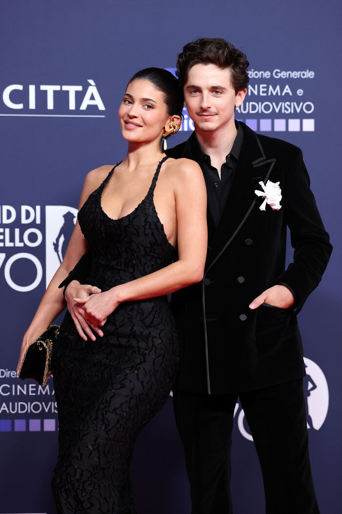 Timothée Chalamet posing on the red carpet with a woman, sharing a bizarre post related to Kylie Jenner’s birthday. Timothée Chalamet posing on the red carpet with a woman, sharing a bizarre post related to Kylie Jenner’s birthday.
