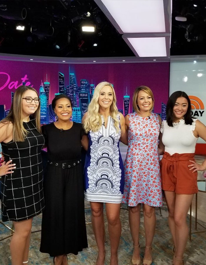 Five women smiling and posing on a TV show set, relating to reality star Kate Gosselin's return to nursing career after downfall. Five women smiling and posing on a TV show set, relating to reality star Kate Gosselin's return to nursing career after downfall.