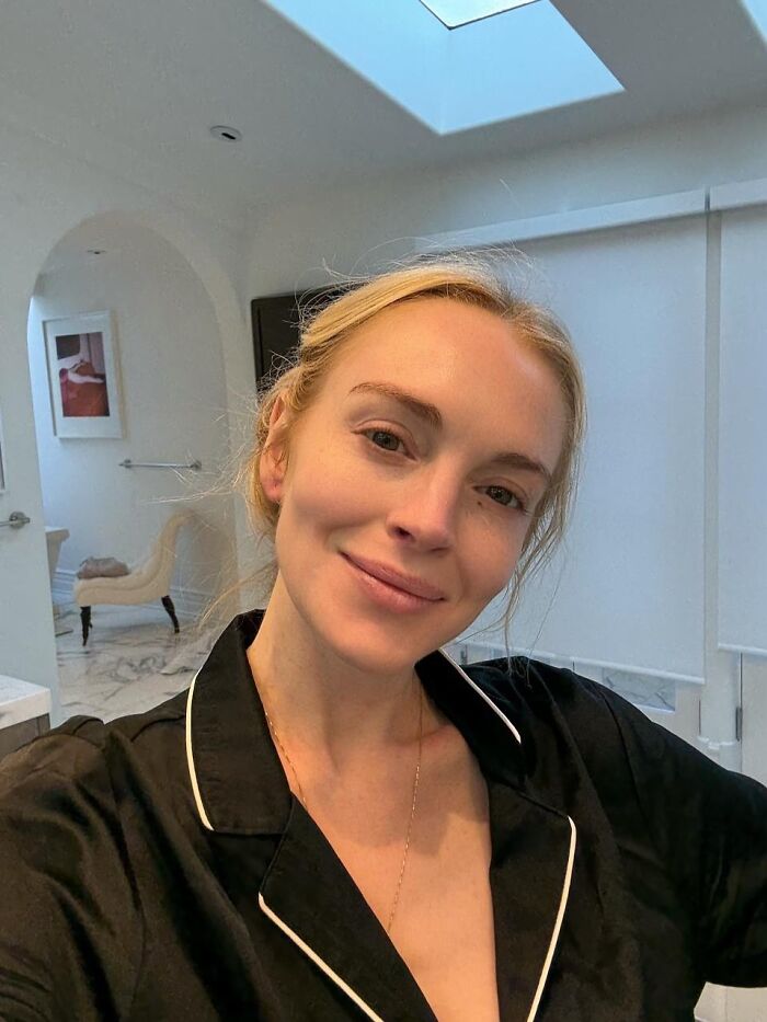 Lindsay Lohan in a makeup-free selfie at home, stunning fans while addressing plastic surgery rumors. Lindsay Lohan in a makeup-free selfie at home, stunning fans while addressing plastic surgery rumors.