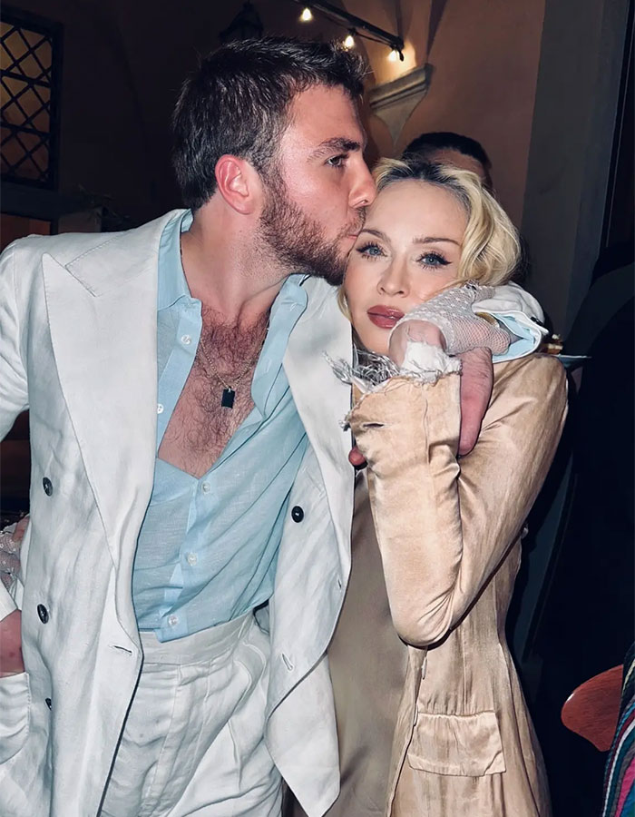 Madonna with her 29YO boyfriend sharing a tender moment amid talks of retirement age and cosmetic change advice. Madonna with her 29YO boyfriend sharing a tender moment amid talks of retirement age and cosmetic change advice.