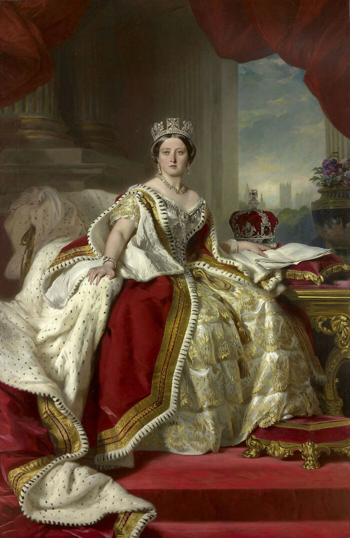 Queen Victoria in regal attire, showcasing historical beauty standards and royal fashion evolution through history.