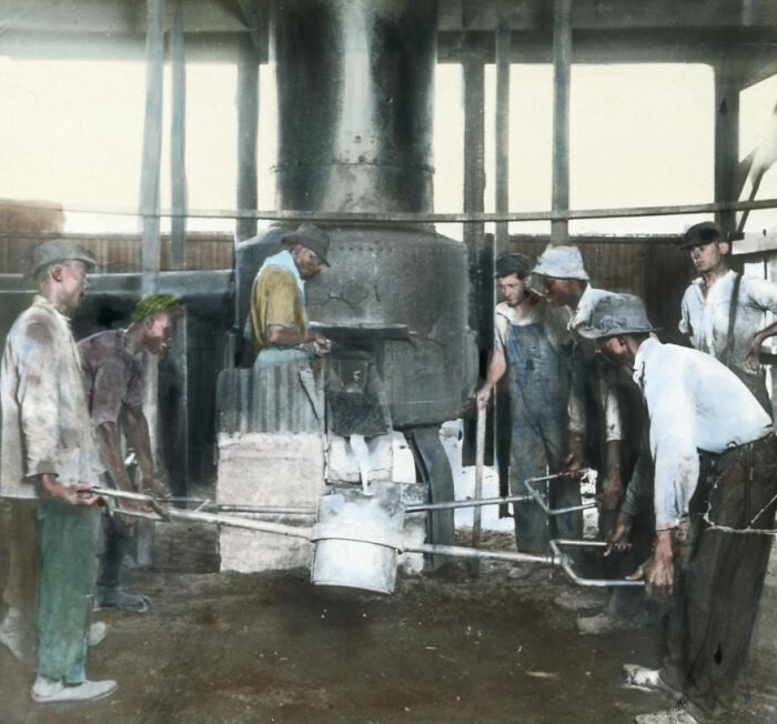 African American men working at a furnace in an industrial setting, showing 1920s labor and life reality.