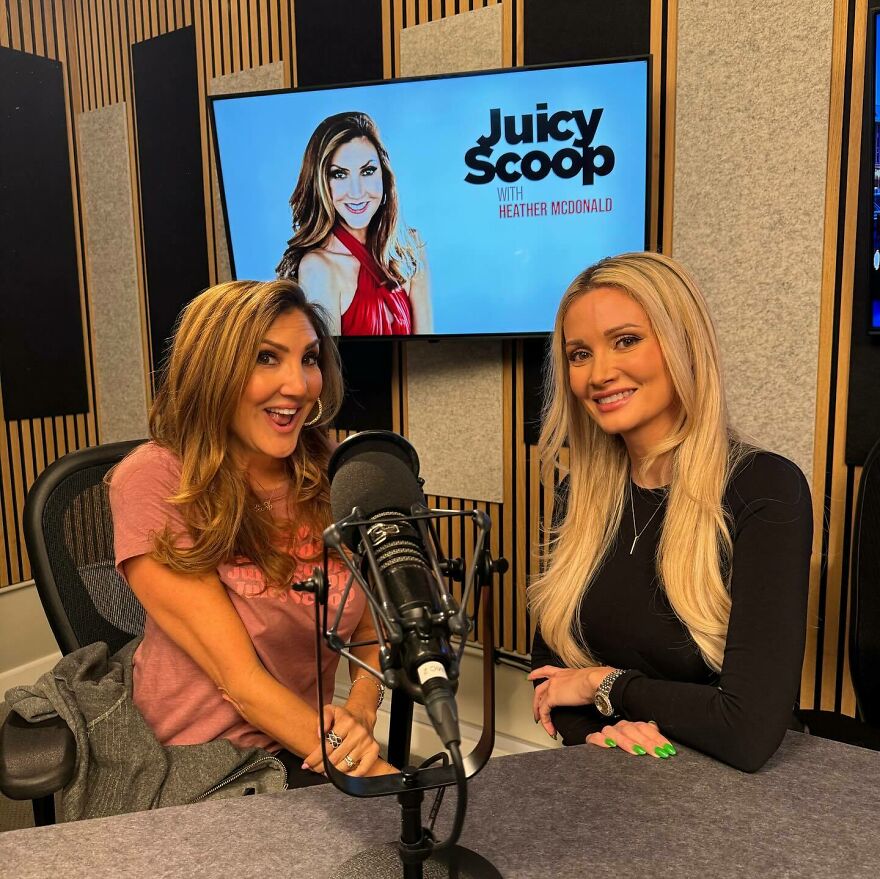 Two women smiling in a podcast studio with a microphone, discussing Stephen Hawking Epstein Island allegations. Two women smiling in a podcast studio with a microphone, discussing Stephen Hawking Epstein Island allegations.