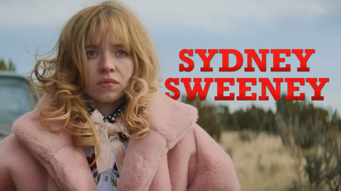 Sydney Sweeney in a pink coat outdoors with her name in red text, relating to movie flop and American Eagle backlash. Sydney Sweeney in a pink coat outdoors with her name in red text, relating to movie flop and American Eagle backlash.