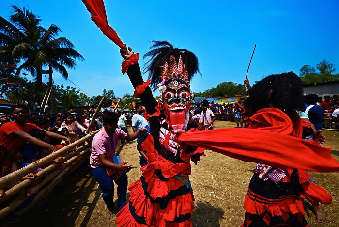 Colorful traditional dance performance in India bursting with vivid colors and lively cultural celebrations outdoors.