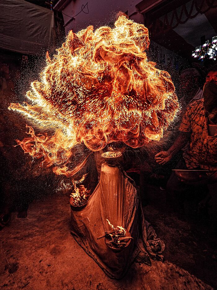 Fiery display of traditional Indian ritual captured in vivid photos of India bursting with color and life by Sammya Brata Mullick.