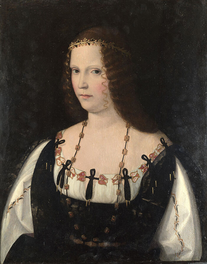 Portrait of a woman from the Renaissance era showcasing historical beauty standards and fashion trends through history.