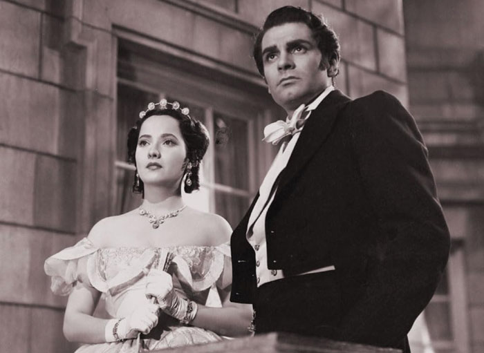 Actors in a dramatic scene from the controversial Wuthering Heights adaptation known for its severe adult content. Actors in a dramatic scene from the controversial Wuthering Heights adaptation known for its severe adult content.