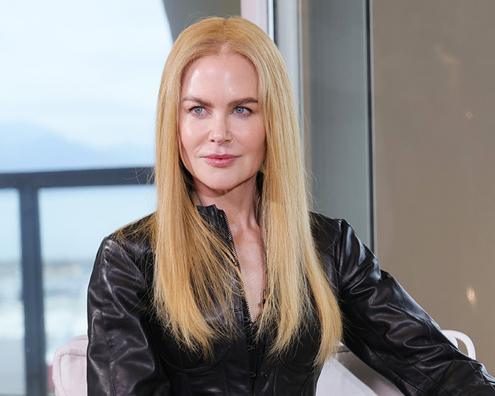 Nicole Kidman with long blonde hair and black leather jacket in a modern indoor setting, related to Ana de Armas controversy. Nicole Kidman with long blonde hair and black leather jacket in a modern indoor setting, related to Ana de Armas controversy.
