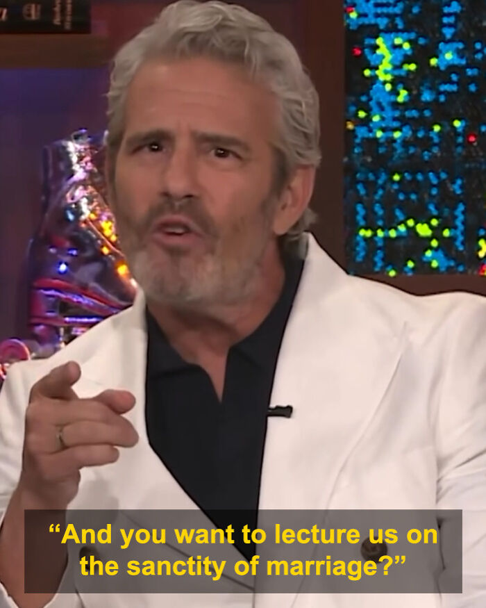Andy Cohen pointing and speaking during a talk show, going viral for his roast of anti-LGBTQ activist Kim Davis. Andy Cohen pointing and speaking during a talk show, going viral for his roast of anti-LGBTQ activist Kim Davis.