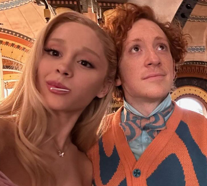 Pete Davidson with a woman, posing indoors, highlighting discussion about size of his manhood scrutiny double standard. Pete Davidson with a woman, posing indoors, highlighting discussion about size of his manhood scrutiny double standard.