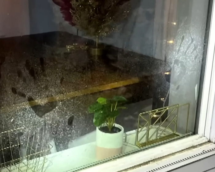 Handprints with red stains on a glass window, reflecting chilling jail footage of Bryan Kohberger being tormented by inmates. Handprints with red stains on a glass window, reflecting chilling jail footage of Bryan Kohberger being tormented by inmates.