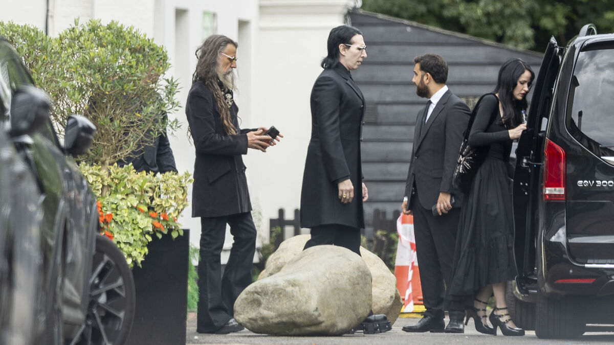 Rock legends gather dressed in black arriving at a family estate for Ozzy Osbourne's intimate lakeside farewell.
