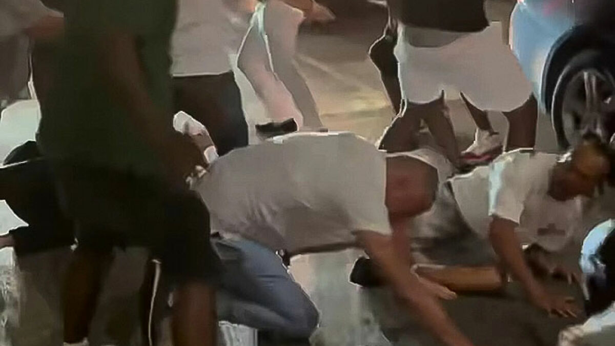 Group of people involved in a violent Cincinnati brawl with a mom brutally punched and knocked out on the ground.