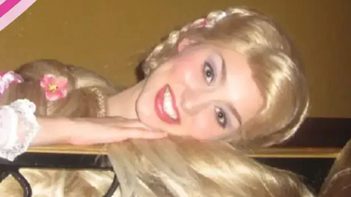 Person dressed as a Disney princess with braided blonde hair and flowers, related to creepy fan x-rated tattoos story.
