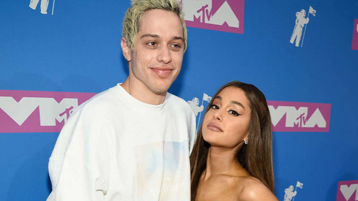 Pete Davidson and Ariana Grande posing at MTV event, highlighting scrutiny of size of his manhood controversy.