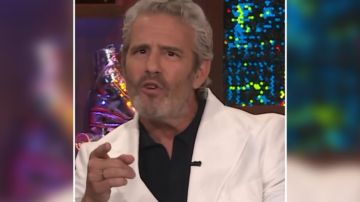Andy Cohen pointing and speaking during a broadcast, going viral for brutal roast of anti-LGBTQ activist Kim Davis.