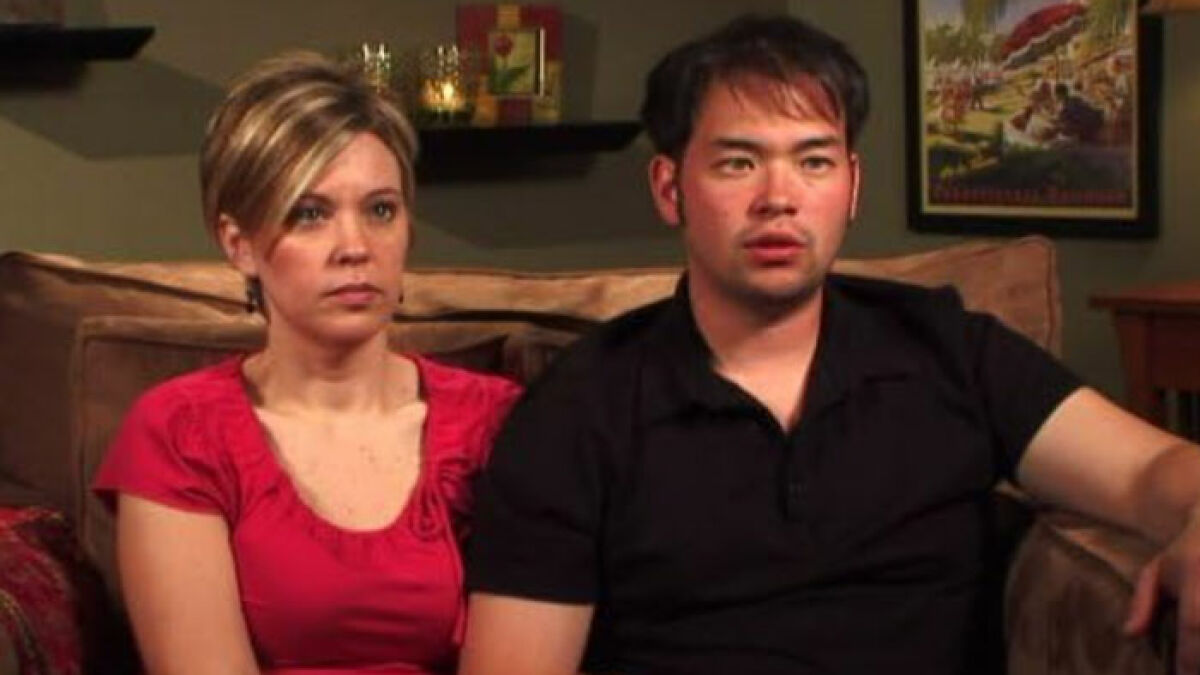 Kate Gosselin sitting on a couch with a man, reflecting on her nursing career after reality star downfall.