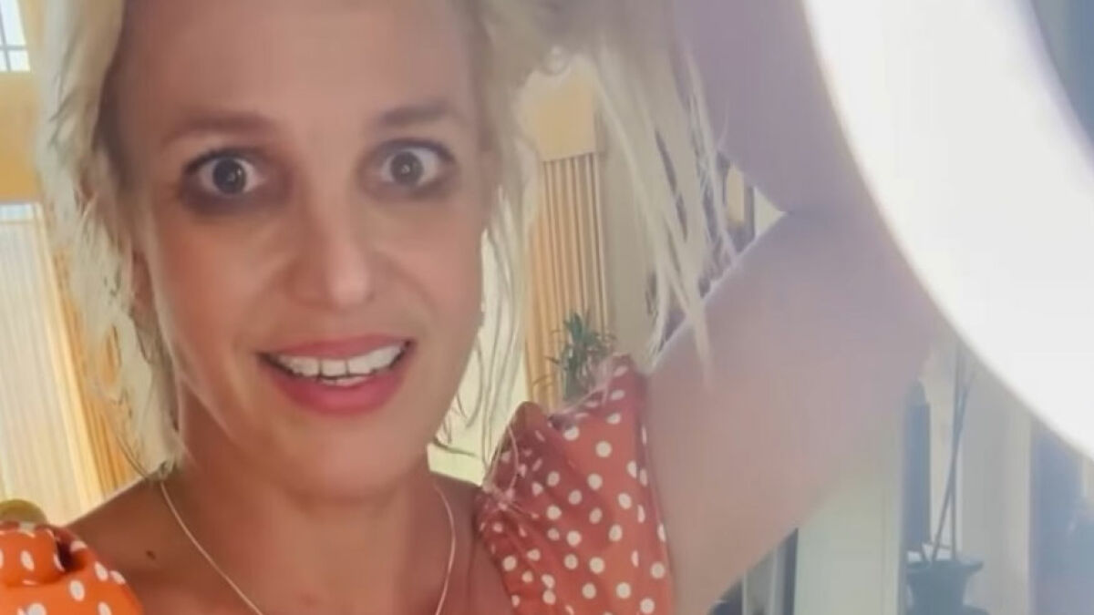 Britney Spears with messy hair in a cluttered house, sparking major worry and calls for intervention from fans