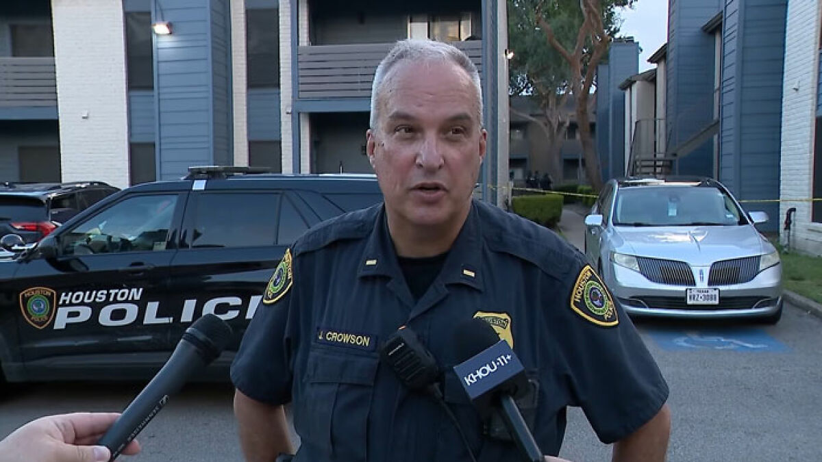 Houston police officer speaking to media about toddlers hungry and thirsty in heartbreaking house scene.