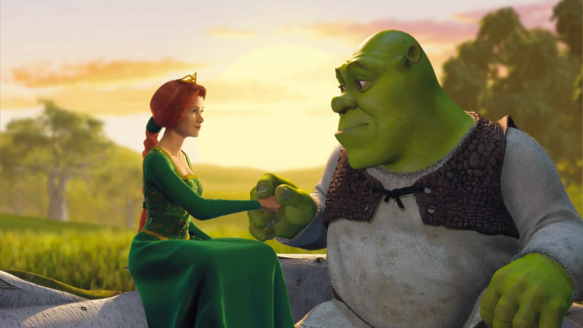 Shrek and Fiona sitting close, holding hands in a sunset scene illustrating the Shrekking dating trend.