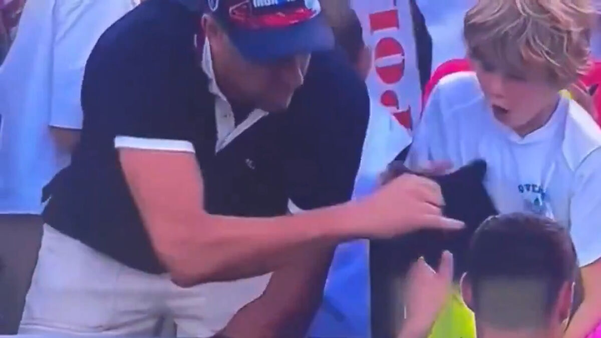 Polish CEO caught on video snatching a hat at the US Open with shocked spectators nearby.