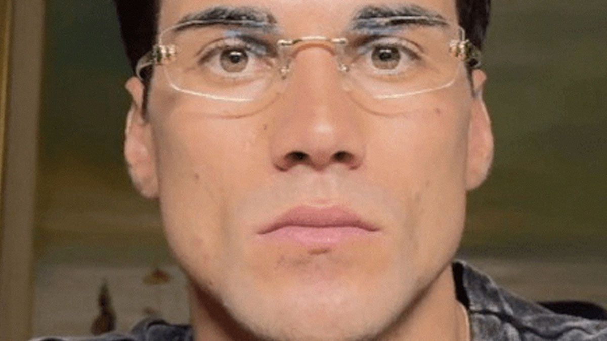 Close-up of a man wearing clear glasses, representing a 27-year-old entrepreneur using AI to publish books and earn millions.