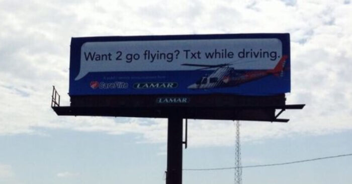 Billboard with a marketing campaign that ironically encourages texting while driving, illustrating marketing campaigns gone wrong.