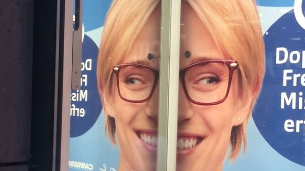 Advertising fail showing a split face image distorted by a door edge, highlighting funny unattainable body portrayal.